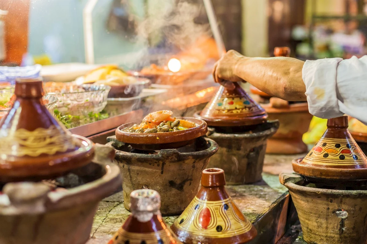 Tagine, couscous and bread on a Moroccan table