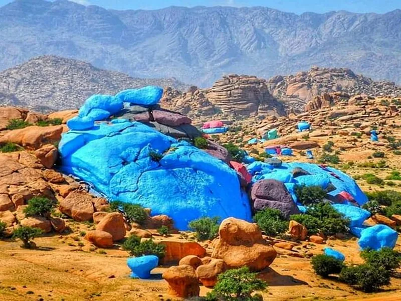 The pink granite boulders and almond groves of the Tafraoute valley in the Anti-Atlas