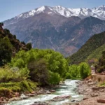 The Ourika river below the snow-capped High Atlas on a private day trip from Marrakech