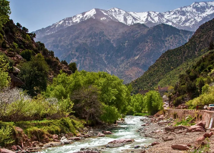 The Ourika river below the snow-capped High Atlas on a private day trip from Marrakech