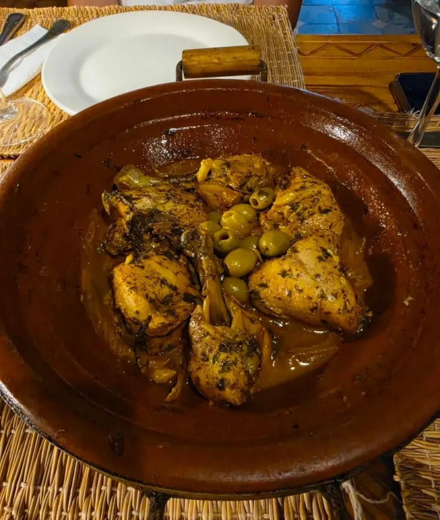 Chicken tagine with olives served for dinner at the Zagora camp